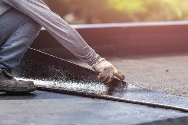 Professional Basement Waterproofing technician working in Baldwin, MI